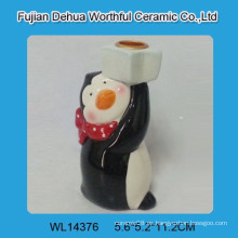Candelabro de cerámica del diseño encantador del pingüino